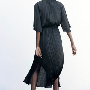 Zara  Black dress. V-neckline NWT